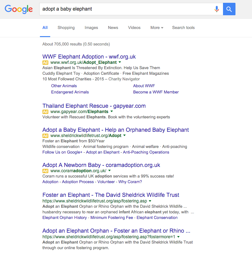 Google AdWords ad with description line 1 promoted to the headline