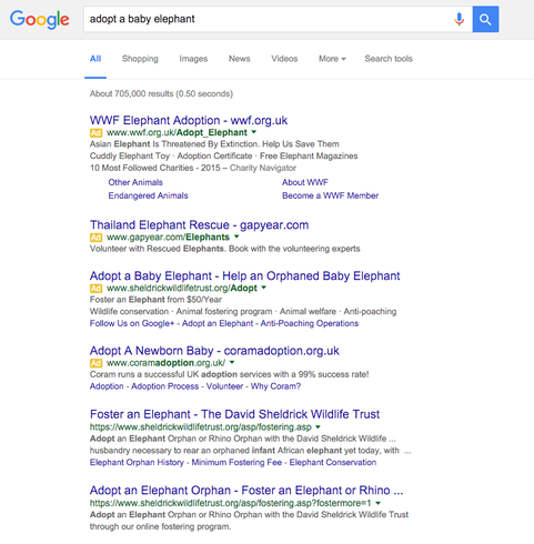 Google AdWords ad with description line 1 promoted to the headline