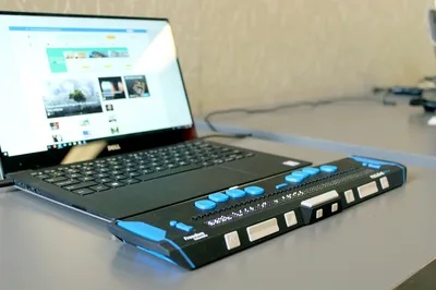 A computer with a refreshable braille display