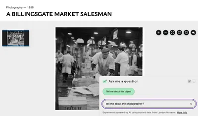 Black and white photo titled “A Billingsgate Market Salesman”, Photography — 1958. Shows fishmongers at work in a busy indoor market, wearing aprons and caps. A chat box overlays the image with the question “tell me about the photographer?” and two buttons: “Tell me about this object” and “Ask me a question”. AI-generated text at bottom reads: “Experiment powered by AI using trusted data from London Museum.”