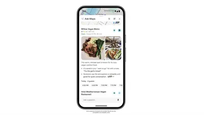 A smartphone screen showing a maps app with a restaurant listing for “Willow Vegan Bistro.” The listing includes photos of plated vegan dishes and the restaurant interior, a 4.7-star rating, price range, and a note that it’s open. A short description highlights cozy vegan comfort food and suggests trying the garlic bread. Reservation times are shown below, along with another nearby restaurant option.