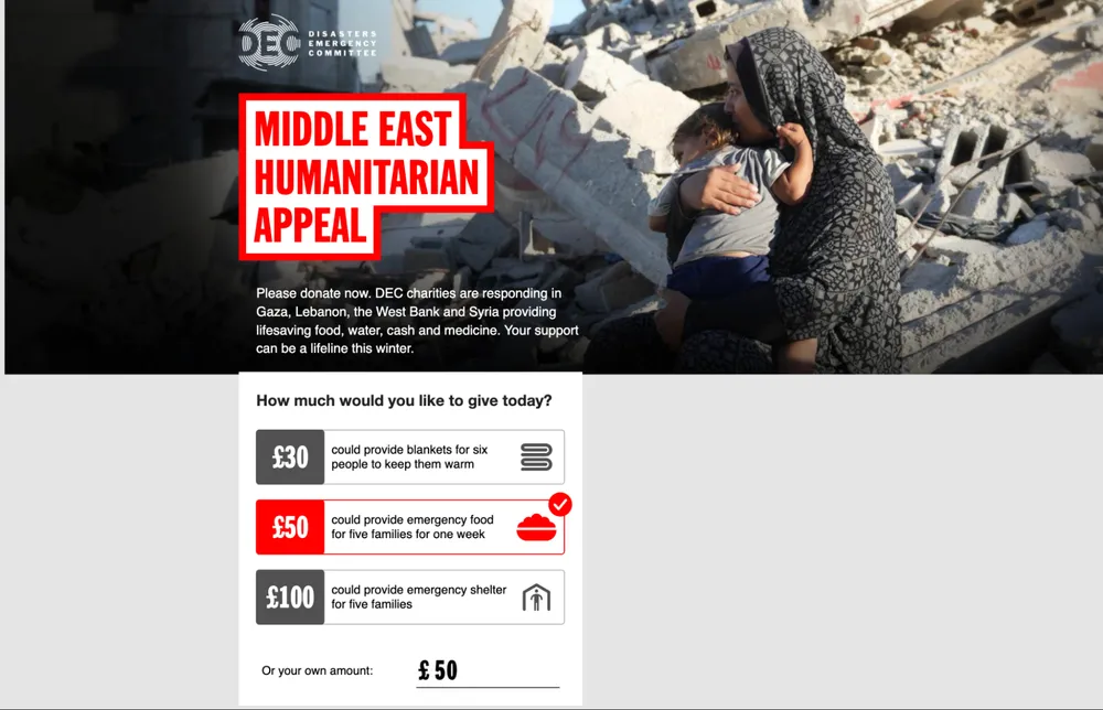 Disasters Emergency Committee Middle East Humanitarian Appeal page showing a woman holding a child among destroyed buildings, with donation options highlighting how different amounts provide emergency aid such as food, shelter and blankets.
